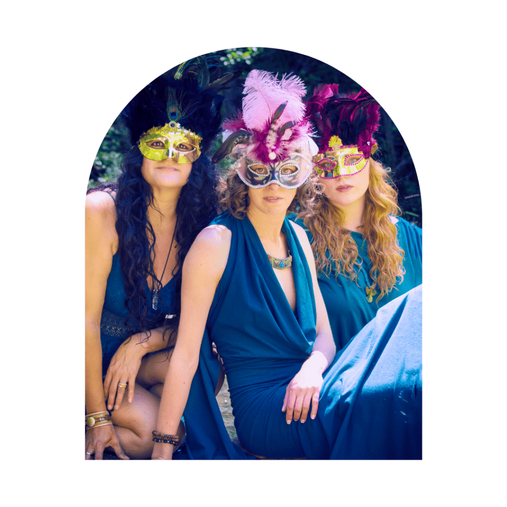 3 WOMEN WEARING HEALING MASQUERADE MASKS