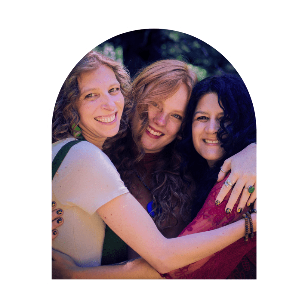 three spiritual women hugging