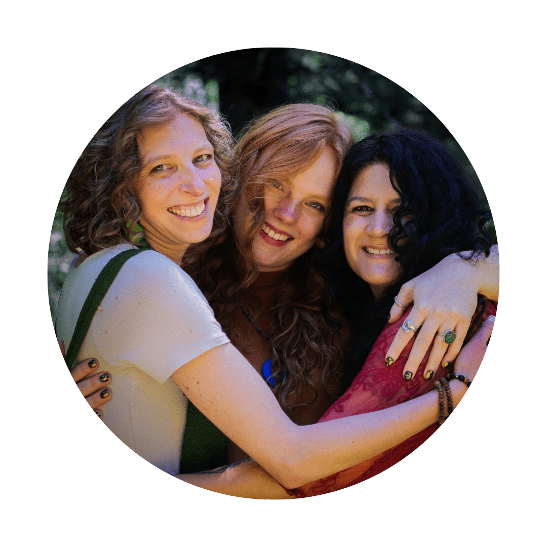 three spiritual women hugging