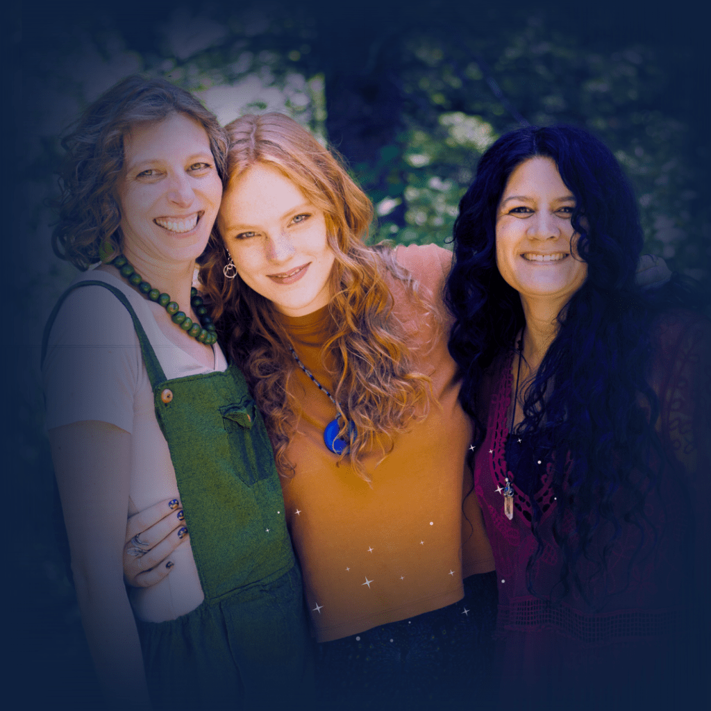 three spiritual women hugging